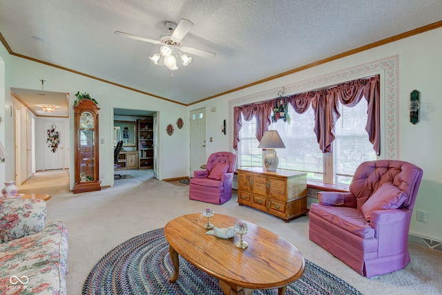 living room with ornamental molding, light carpet, a textured ceiling, a ceiling fan, and vaulted ceiling