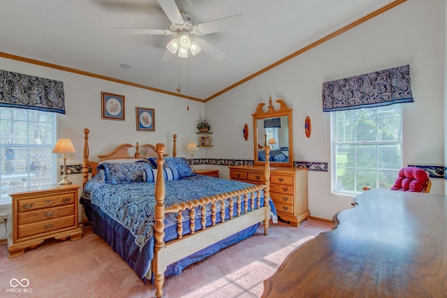 bedroom featuring crown molding, ceiling fan, vaulted ceiling, and light colored carpet