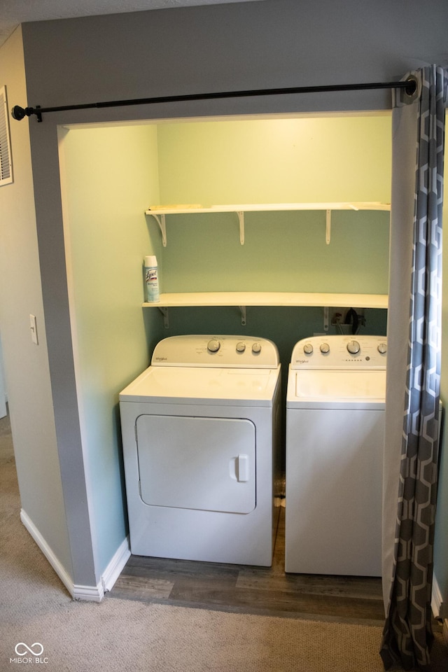 8912 Hosta Way, Indianapolis, IN 46113 - laundry area featuring washer and clothes dryer and wood finished floors