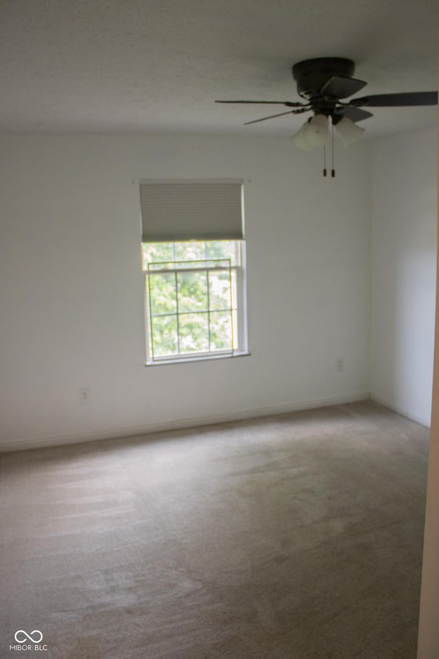 8912 Hosta Way, Indianapolis, IN 46113 - carpeted spare room with ceiling fan