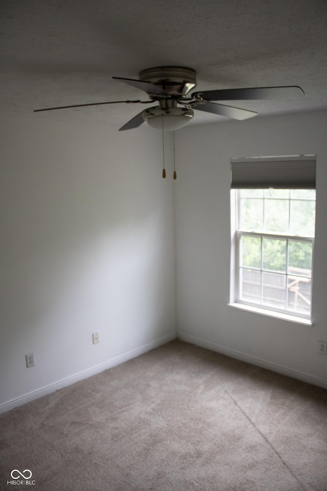 8912 Hosta Way, Indianapolis, IN 46113 - carpeted spare room with a ceiling fan and baseboards