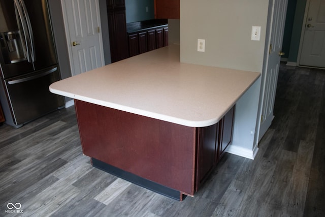 8912 Hosta Way, Indianapolis, IN 46113 - kitchen featuring refrigerator with ice dispenser, dark wood-style flooring, and light countertops