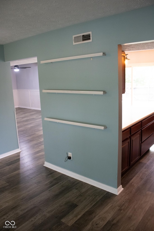 8912 Hosta Way, Indianapolis, IN 46113 - interior space featuring dark wood-style floors and a textured ceiling