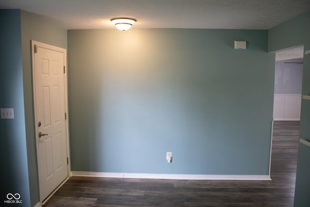 8912 Hosta Way, Indianapolis, IN 46113 - empty room with dark wood-type flooring and baseboards