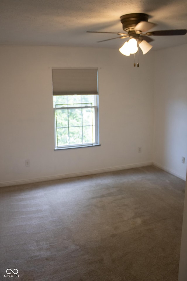 8912 Hosta Way, Indianapolis, IN 46113 - carpeted spare room featuring ceiling fan and baseboards