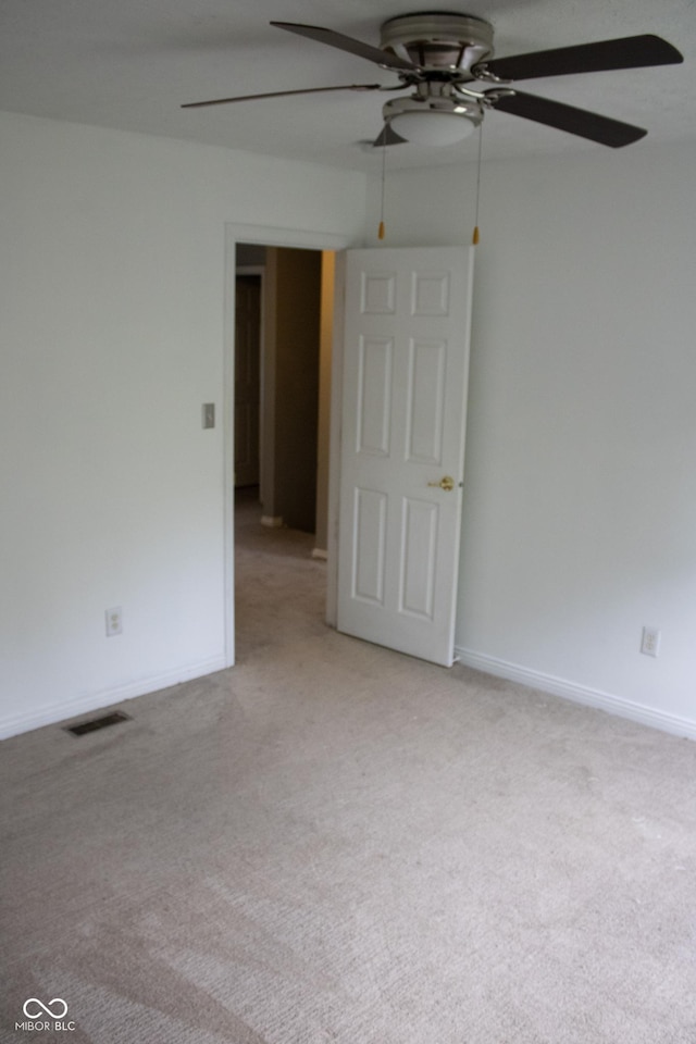 8912 Hosta Way, Indianapolis, IN 46113 - empty room with ceiling fan and light colored carpet