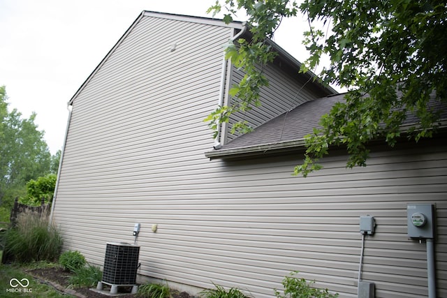 8912 Hosta Way, Indianapolis, IN 46113 - view of property exterior with a central air condition unit and a shingled roof