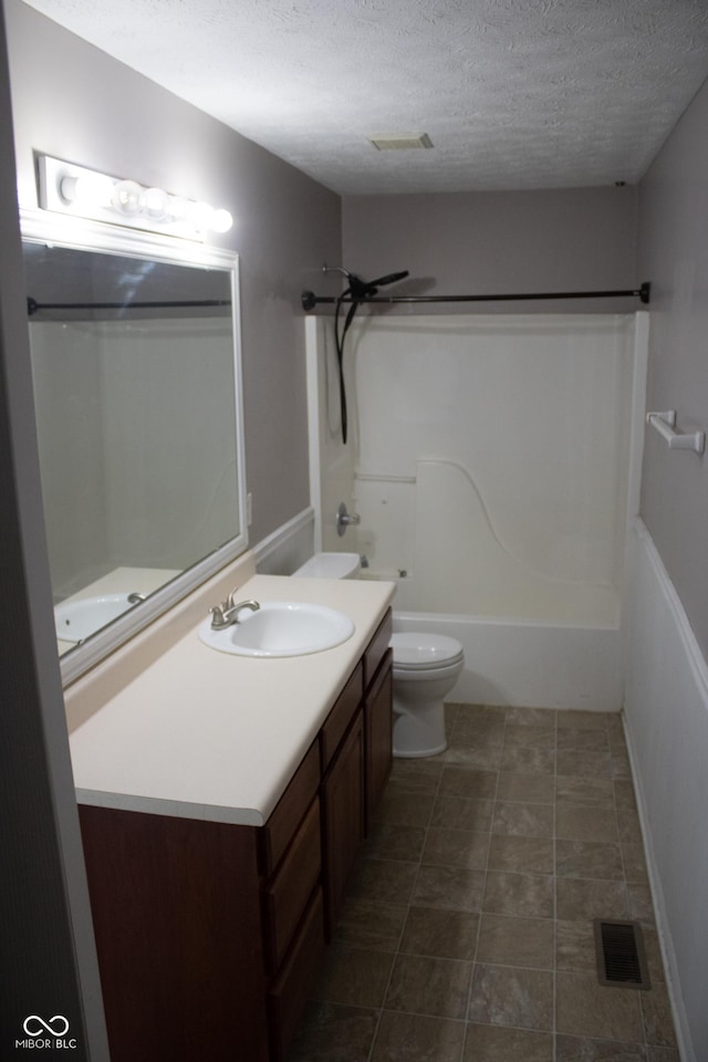 8912 Hosta Way, Indianapolis, IN 46113 - full bath featuring a textured ceiling, shower / bathtub combination, and vanity