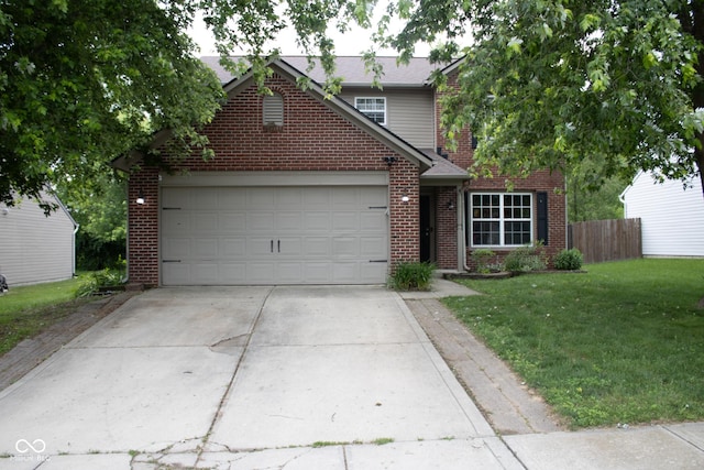 8912 Hosta Way, Indianapolis, IN 46113 - traditional-style home featuring driveway, brick siding, and a garage