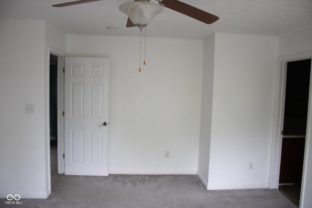 8912 Hosta Way, Indianapolis, IN 46113 - unfurnished bedroom with carpet floors and ceiling fan