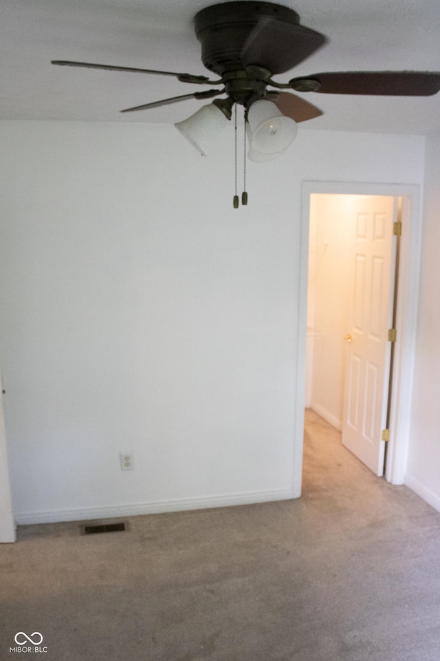 8912 Hosta Way, Indianapolis, IN 46113 - carpeted spare room with ceiling fan and baseboards
