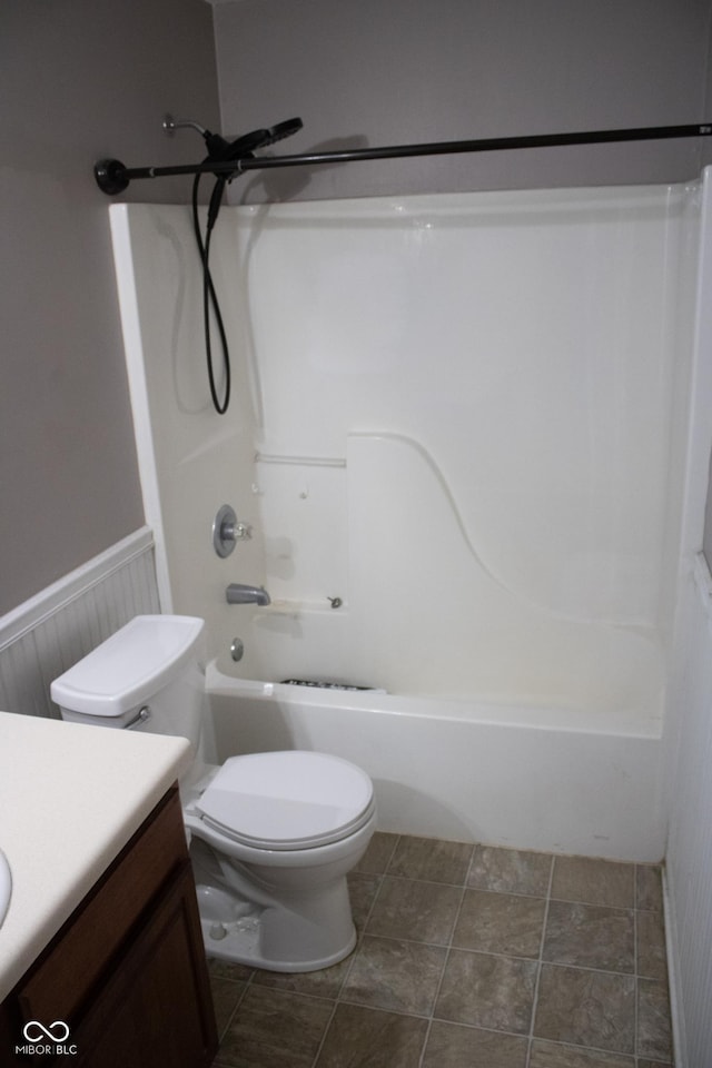 8912 Hosta Way, Indianapolis, IN 46113 - bathroom featuring vanity, bathtub / shower combination, and a wainscoted wall