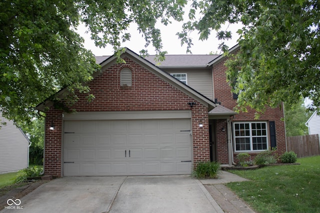 8912 Hosta Way, Indianapolis, IN 46113 - traditional home with driveway, brick siding, and an attached garage