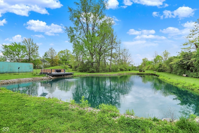 water view featuring fence