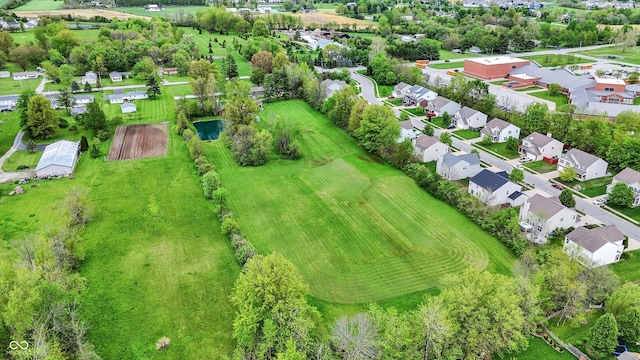 aerial overview of property's location featuring nearby suburban area
