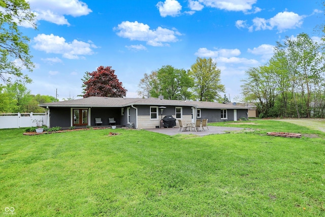 rear view of property with a patio area