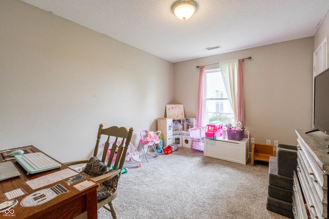 recreation room featuring carpet flooring and visible vents