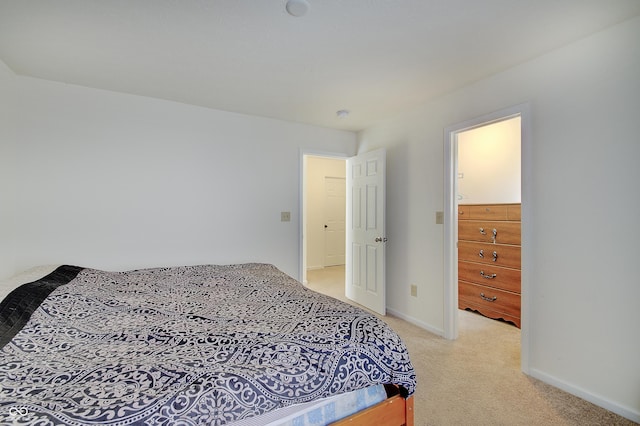 7303 Beal Ln, Indianapolis, IN 46217 - bedroom with light carpet and baseboards