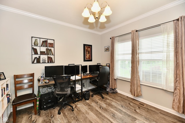 office area featuring an inviting chandelier, ornamental molding, visible vents, wood finished floors, and baseboards