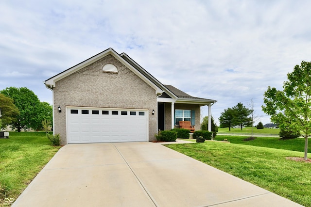 view of front of house with a garage, a front yard, brick siding, central AC unit, and concrete driveway