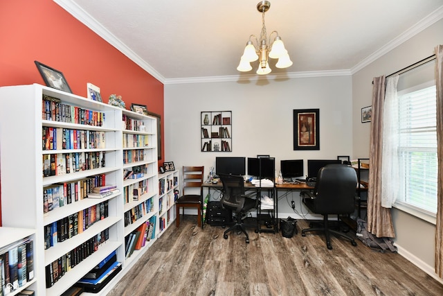 office featuring an inviting chandelier, ornamental molding, wood finished floors, and plenty of natural light