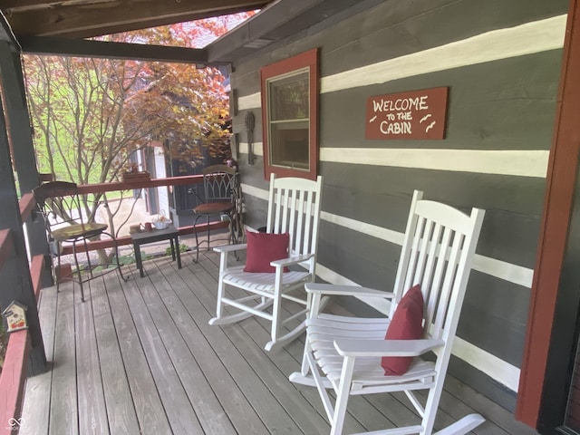deck with covered porch