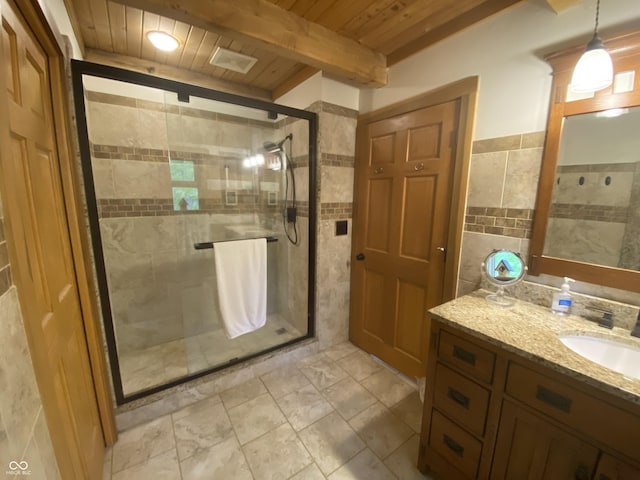 full bathroom featuring beamed ceiling, tile walls, wooden ceiling, and a shower stall