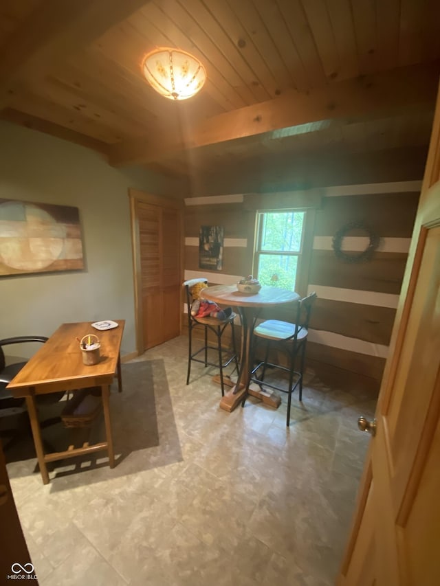 dining area featuring wooden ceiling and light floors