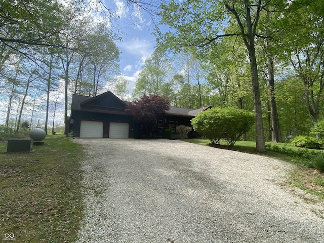 exterior space featuring an attached garage and driveway