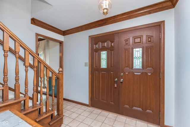 1421 Stoney Creek Cir, Carmel, IN 46032 - entryway featuring baseboards, stairway, ornamental molding, and light tile patterned floors