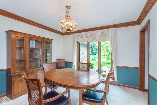1421 Stoney Creek Cir, Carmel, IN 46032 - dining area featuring a chandelier, baseboards, crown molding, and light colored carpet