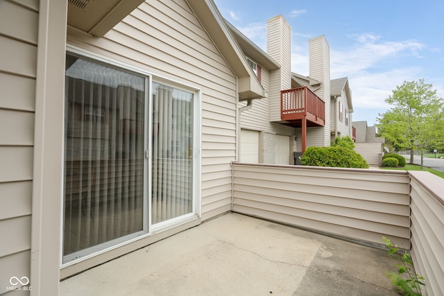 view of patio / terrace with a balcony