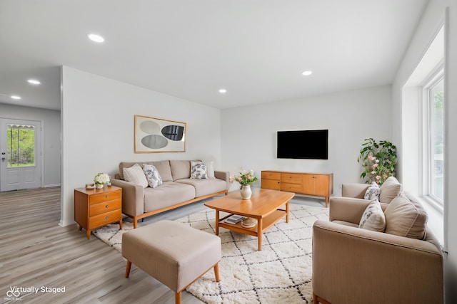 1116 Heatherwood Dr, Indianapolis, IN 46241 - living room featuring light wood-type flooring and recessed lighting