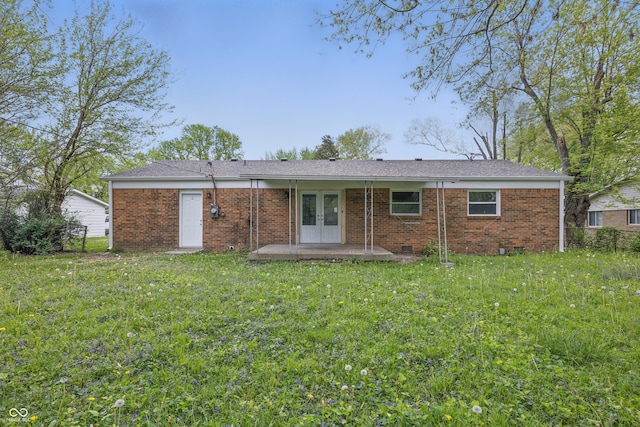 1116 Heatherwood Dr, Indianapolis, IN 46241 - back of house featuring french doors, a lawn, crawl space, and brick siding