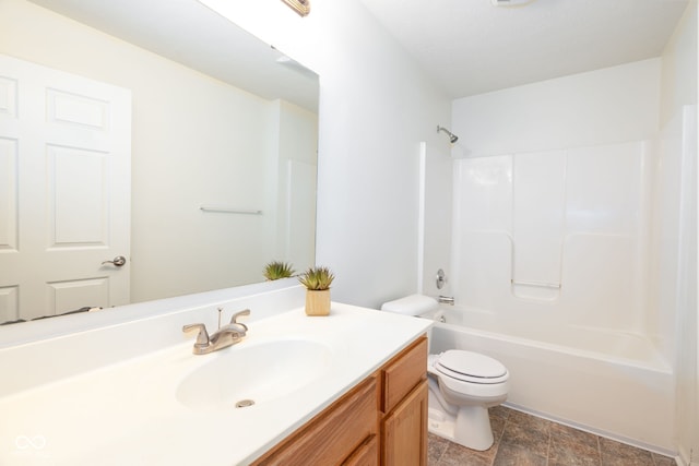 3006 Wildcat Ln, Indianapolis, IN 46203 - full bath featuring stone finish flooring, toilet, vanity, and shower / bath combination