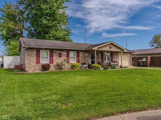 632 Woodside Ct, Seymour, IN 47274 - ranch-style house with brick siding, a front lawn, and fence