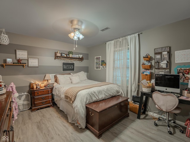 632 Woodside Ct, Seymour, IN 47274 - bedroom featuring a ceiling fan, visible vents, and light wood-style flooring