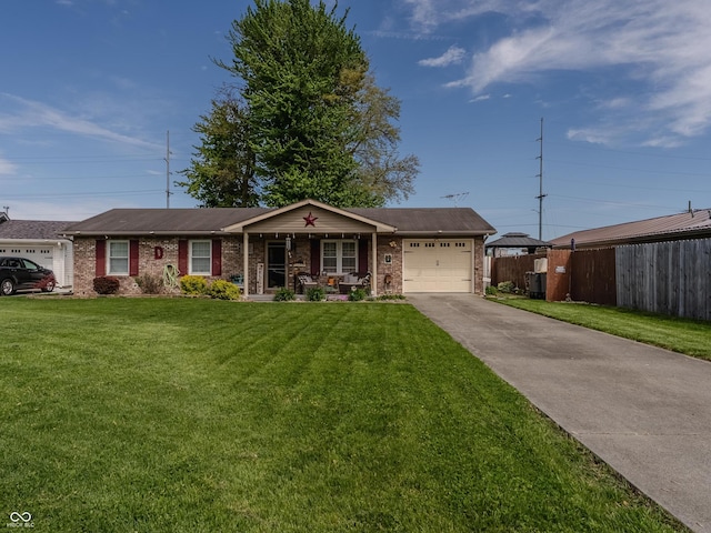 632 Woodside Ct, Seymour, IN 47274 - ranch-style home featuring fence, brick siding, a garage, a front yard, and driveway
