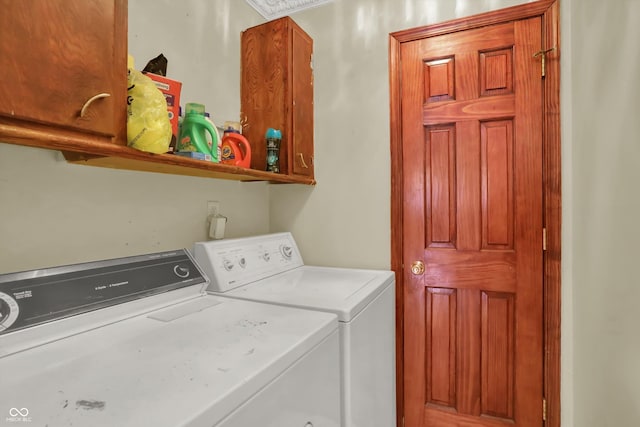 5027 E 40th St, Indianapolis, IN 46226 - laundry area featuring cabinet space and washer and dryer