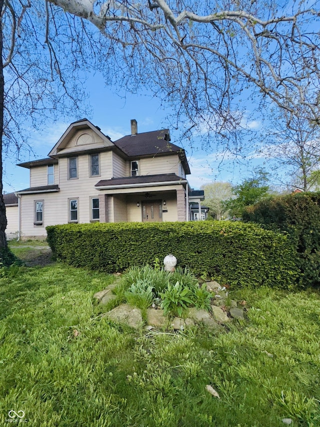 exterior space featuring a chimney
