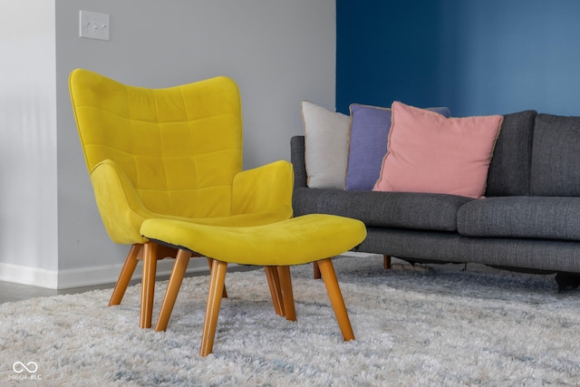 living room featuring baseboards