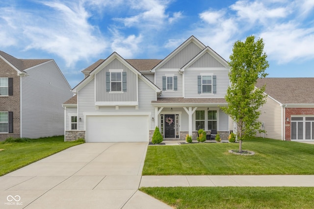 craftsman-style house with an attached garage, a front lawn, stone siding, board and batten siding, and driveway