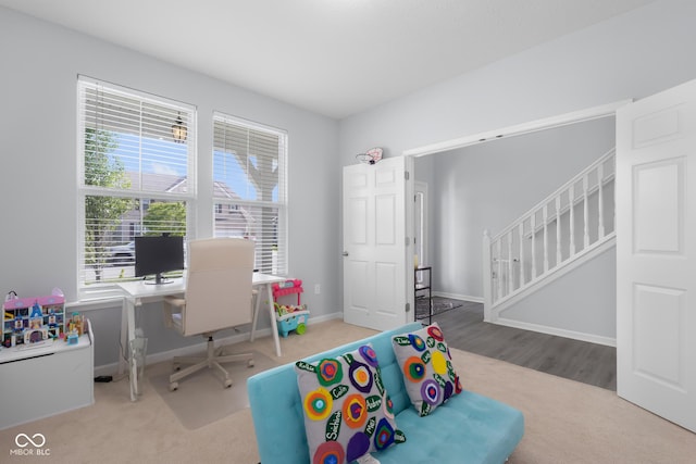 game room featuring baseboards and carpet floors