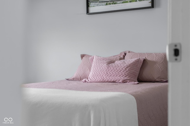 bedroom with multiple windows