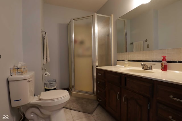 9903 E Raymond St, Indianapolis, IN 46239 - bathroom featuring toilet, decorative backsplash, a shower stall, and tile patterned flooring
