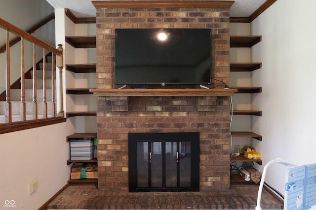 9903 E Raymond St, Indianapolis, IN 46239 - room details featuring crown molding, baseboards, and a brick fireplace