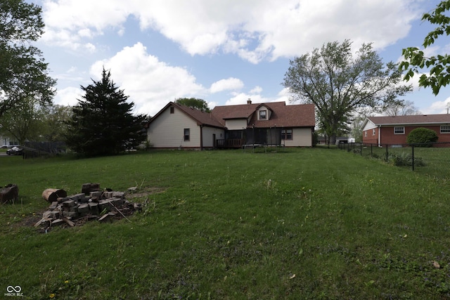 9903 E Raymond St, Indianapolis, IN 46239 - view of yard with a trampoline and fence