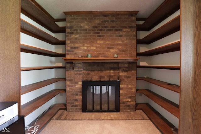 9903 E Raymond St, Indianapolis, IN 46239 - unfurnished living room with crown molding and a fireplace