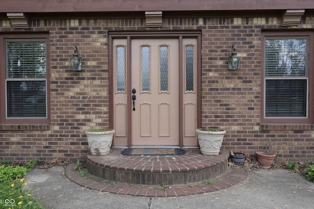 9903 E Raymond St, Indianapolis, IN 46239 - view of exterior entry featuring brick siding