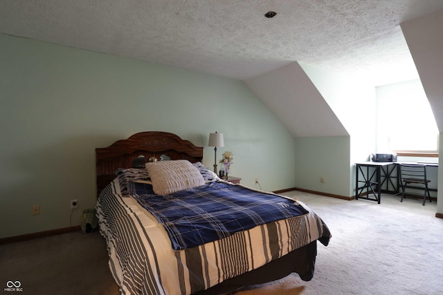 9903 E Raymond St, Indianapolis, IN 46239 - bedroom with baseboards, carpet flooring, a textured ceiling, and lofted ceiling